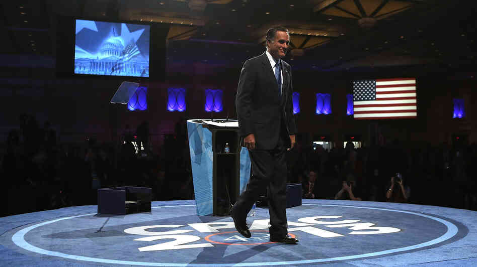 Former Republican presidential candidate Mitt Romney leaves the stage after speaking Friday at the Conservative Political Action Conference in Maryland's National Harbor.