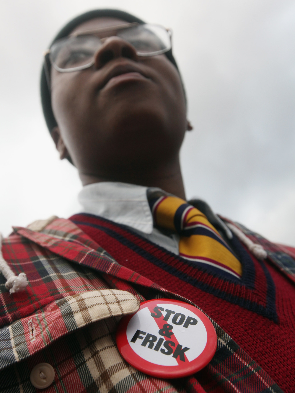 An opponent of the New York Police Department's controversial stop-and-frisk policy marches last year in New York City. The NYPD says the stops assist crime prevention, while opponents say they involve racial profiling and civil rights abuses.