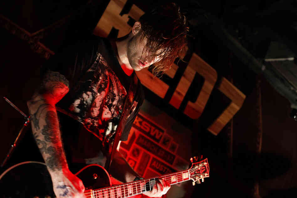 Noise-rock band KEN mode pummeling Red 7 at SXSW 2013.