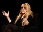 Stevie Nicks speaking on stage at the 2013 South by Southwest Music Festival in Austin, Texas.