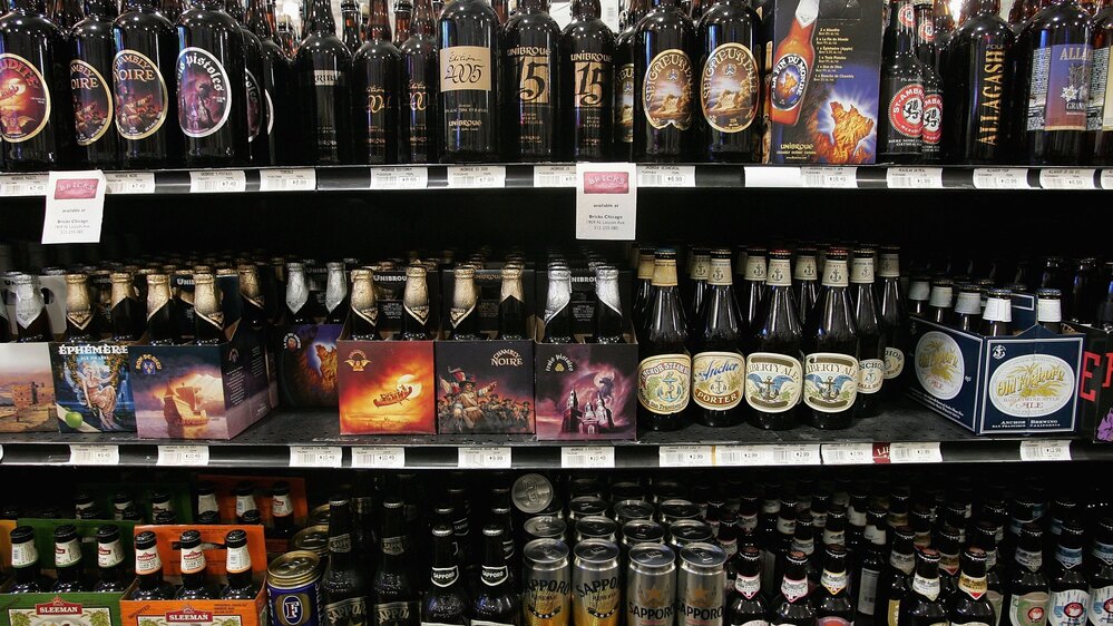 Craft beers are offered for sale at Sam's Wines and Spirits in Chicago. Craft beer has about a 6 percent market share in the U.S. beer market, which is dominated by Anheuser-Busch InBev and MillerCoors.