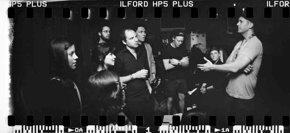 John Riedie, Mother Falcon's manager, gives a pep talk shortly before the band takes the stage at The Parish. John Riedie, Mother Falcon's manager, gives a pep talk shortly before the band takes the stage at The Parish.