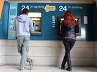 Take the money and run: An ATM in the Cypriot capital Nicosia on Sunday. Take the money and run: An ATM in the Cypriot capital Nicosia on Sunday.