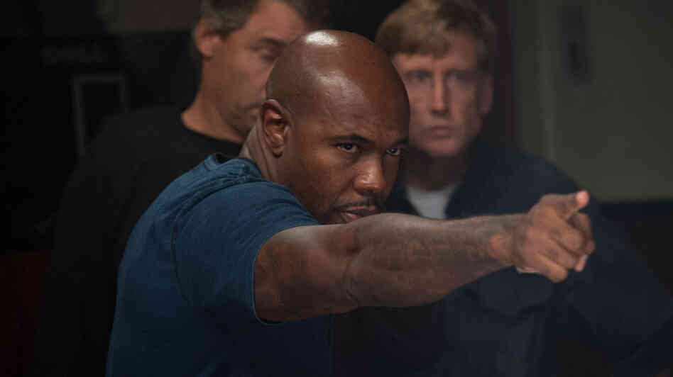 Director Antoine Fuqua on the set of Olympus Has Fallen.