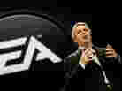 Electronic Arts CEO John Riccitiello, seen here speaking at the E3 Expo in 2010, is stepping down, the company announced Monday.