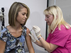 Lauren Fant winces as she receives her third and final shot of HPV vaccine from nurse Stephanie Pearson in Marietta, Ga., in 2007. Lauren Fant winces as she receives her third and final shot of HPV vaccine from nurse Stephanie Pearson in Marietta, Ga., in 2007.