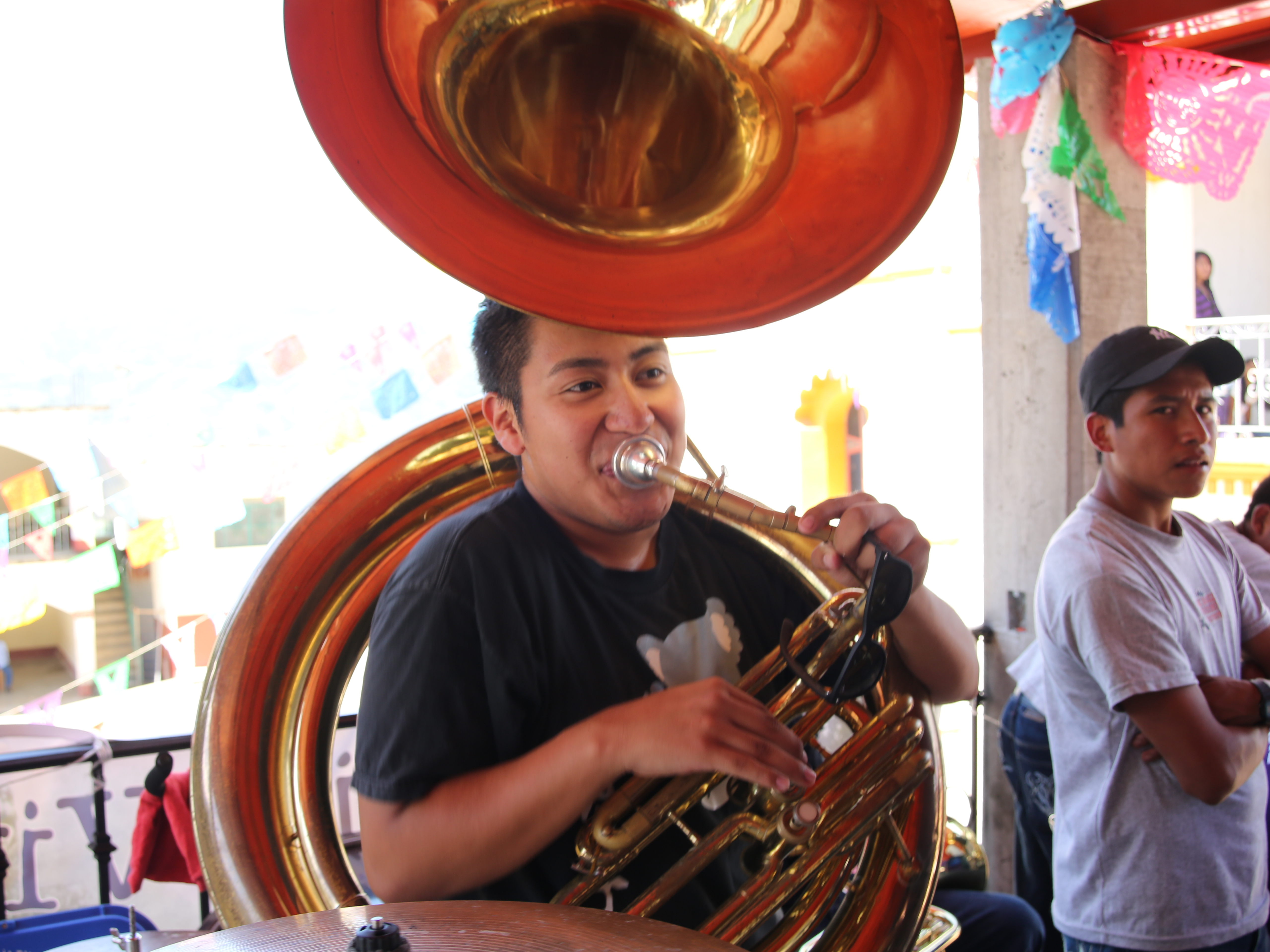 Julian Gonzalez playing his tuba in Santa Maria Tavehua.