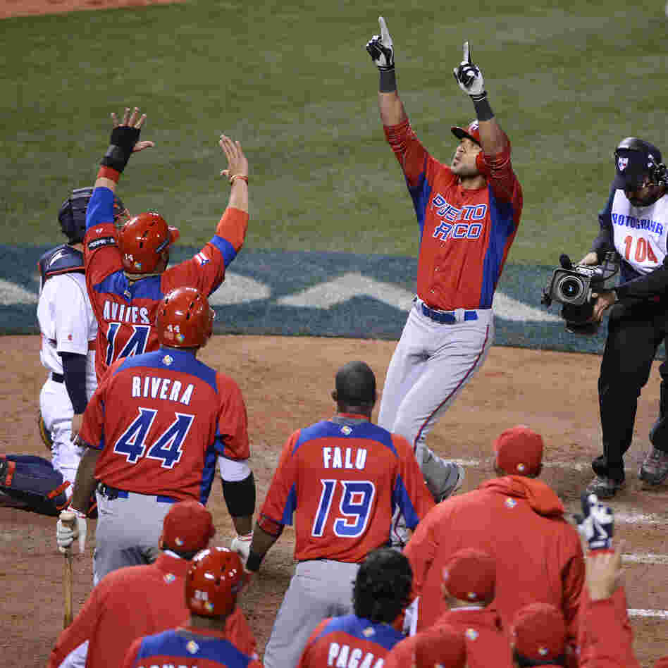 Puerto Rico's Alex Rios celebrated Sunday with teammates after hitting a two-run home run in the seventh inning against Japan in the semi-finals of the World Baseball Classic at AT&T Park in San Francisco.