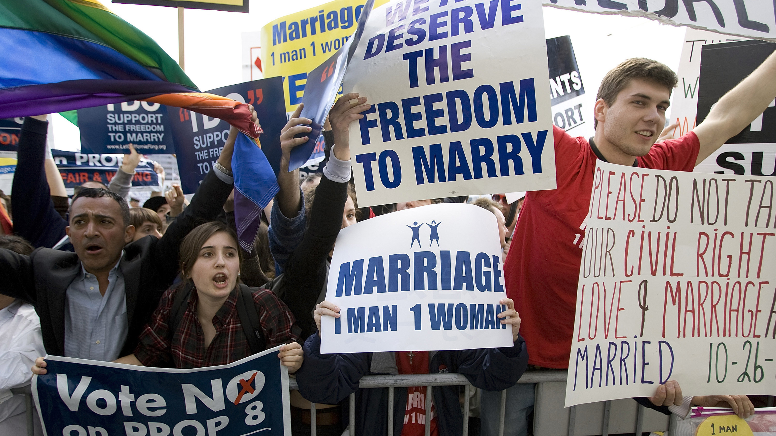 People rally in front of the California Supreme Court building in March 2009 after arguments were heard on the gay marriage ban.
