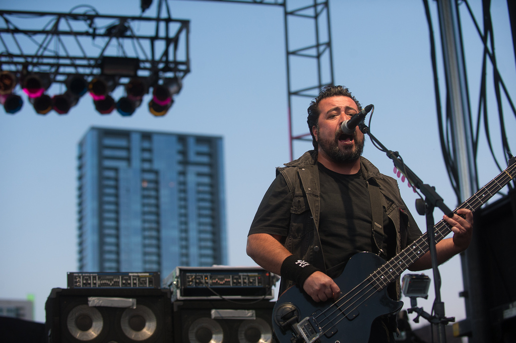 Molotov's Miky Huidobro performs at Auditorium Shores. The Mexico City band mixes politics and <em>rock en </em><em>Español</em>.