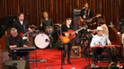 Natalie Maines (center) at Central Presbyterian Church in Austin, Texas during the SXSW Music Festival. Maines's band included her father, Lloyd Maines (seated left) and Ben Harper (seated right). Natalie Maines (center) at Central Presbyterian Church in Austin, Texas during the SXSW Music Festival. Maines's band included her father, Lloyd Maines (seated left) and Ben Harper (seated right).