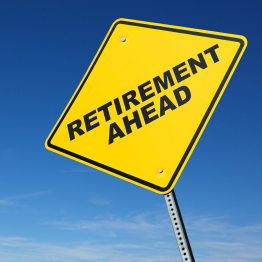 A yellow sign reads "Retirement Ahead."