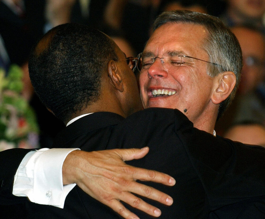 David Wilson (left) and Rob Compton embrace after being married by a Unitarian minister at the Arlington Street Church in Boston on May 17, 2004. They were one of the first couples in Massachusetts to be legally wed.