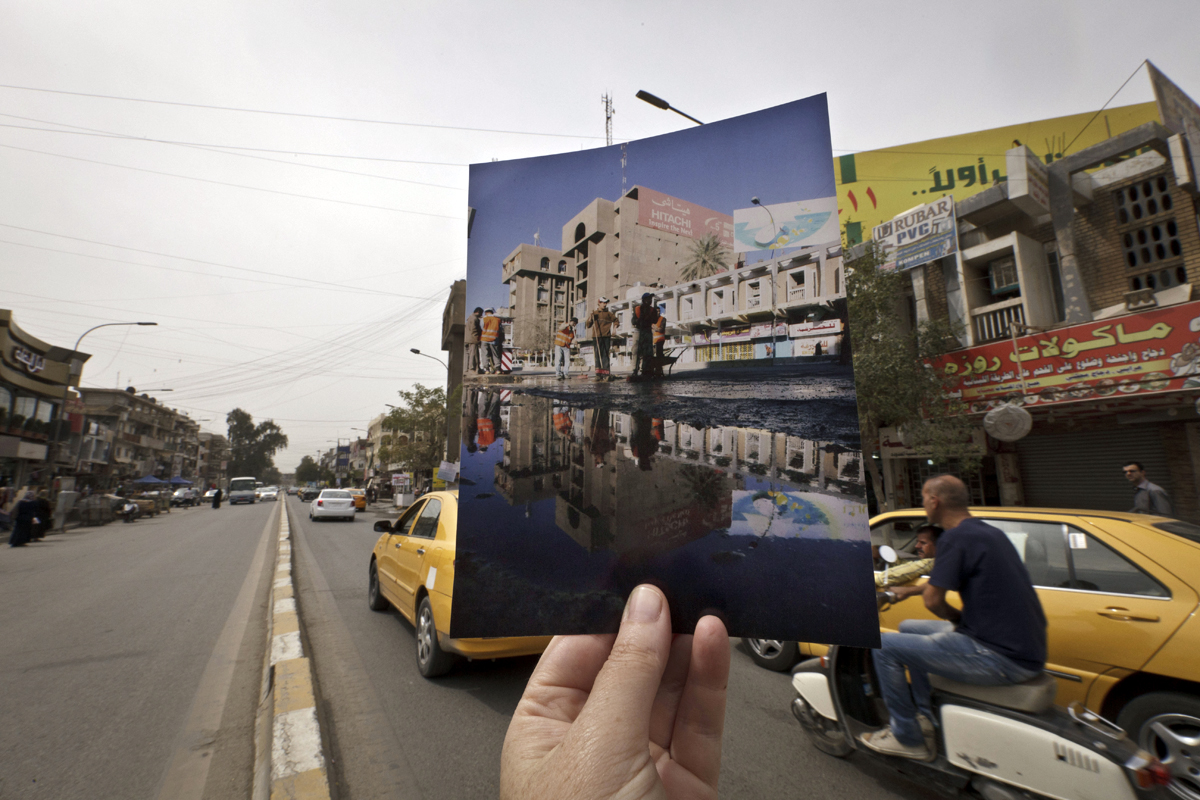 Today, motorists fill the main street in Baghdad's busy Karrada shopping district. The 2008 image was taken by Hadi Mizban after a bombing that killed 53 people and wounded 130.