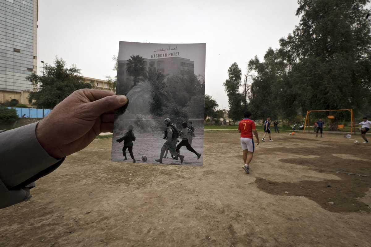 Abu Nawas park in Baghdad, the site of a 2003 photograph taken by Maya Alleruzzo, shows Iraqi orphans playing soccer with a U.S. soldier from the 3rd Infantry Division.