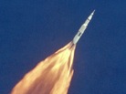 Apollo 11 climbs toward orbit after liftoff on July 16, 1969. In 2 1/2 minutes of powered flight, the S-IC booster lifts the vehicle to an altitude of about 39 miles, some 55 miles downrange. Apollo 11 climbs toward orbit after liftoff on July 16, 1969. In 2 1/2 minutes of powered flight, the S-IC booster lifts the vehicle to an altitude of about 39 miles, some 55 miles downrange.