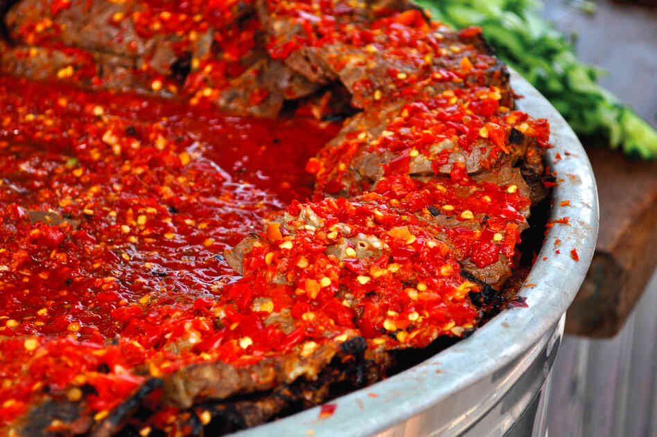 Filfil Mat'houn is a paste made of red chili peppers conserved in oil and sold as a condiment.