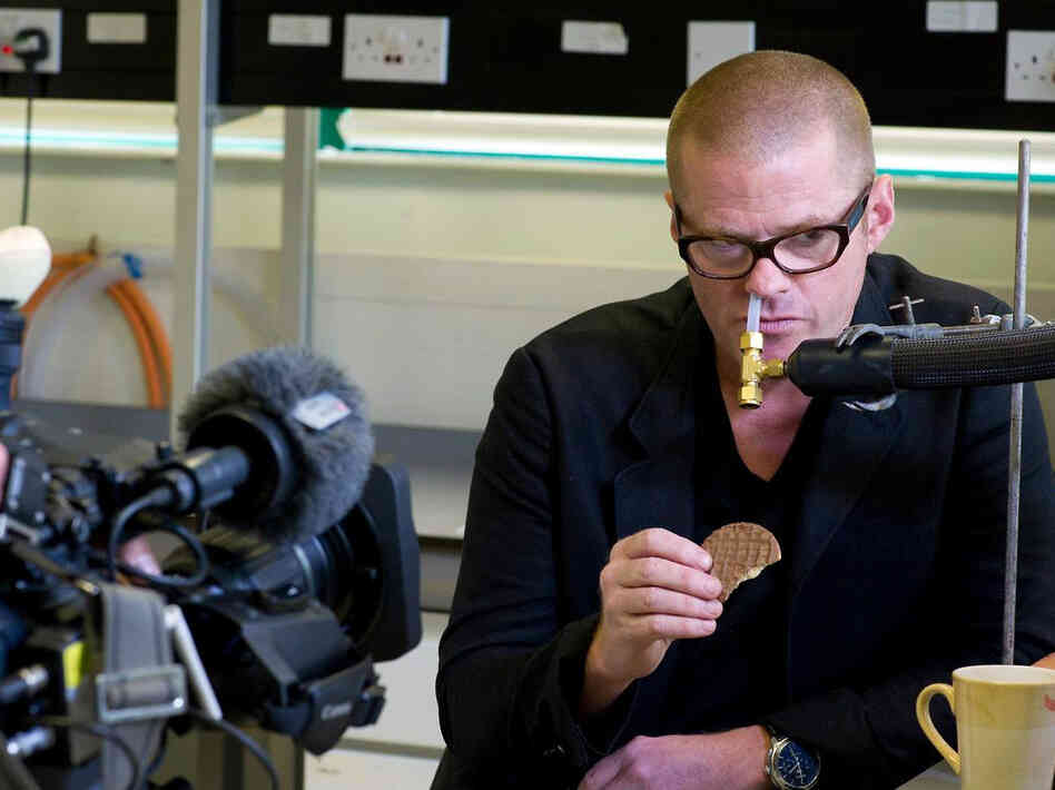 Hooked up to a gadget that measures food flavors, chef Heston Blumenthal tests whether a cookie tastes better after it's dipped into tea.