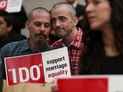 Frank Capley (left) and Joe Alfano protest the San Francisco county clerk's denial of marriage licenses to same-sex couples on Feb. 14. Frank Capley (left) and Joe Alfano protest the San Francisco county clerk's denial of marriage licenses to same-sex couples on Feb. 14.