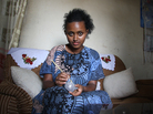 Woman sculpting a clay pot in Addis Ababa, the capital of Ethiopia, June 2011 Woman sculpting a clay pot in Addis Ababa, the capital of Ethiopia, June 2011