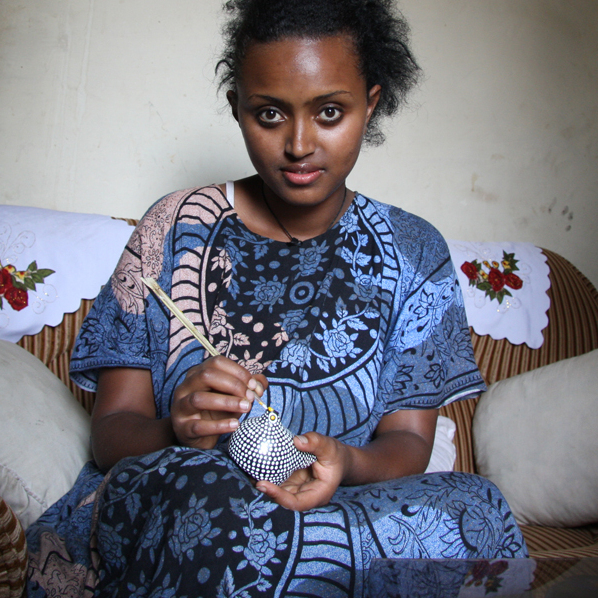 Woman sculpting a clay pot in Addis Ababa, the capital of Ethiopia, June 2011.