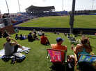 Baseball fans watch an exhibition spring training game between the Washington Nationals and the New York Mets in Port St. Lucie, Fla. Spring training contributes $35 million to the local economy. Baseball fans watch an exhibition spring training game between the Washington Nationals and the New York Mets in Port St. Lucie, Fla. Spring training contributes $35 million to the local economy.
