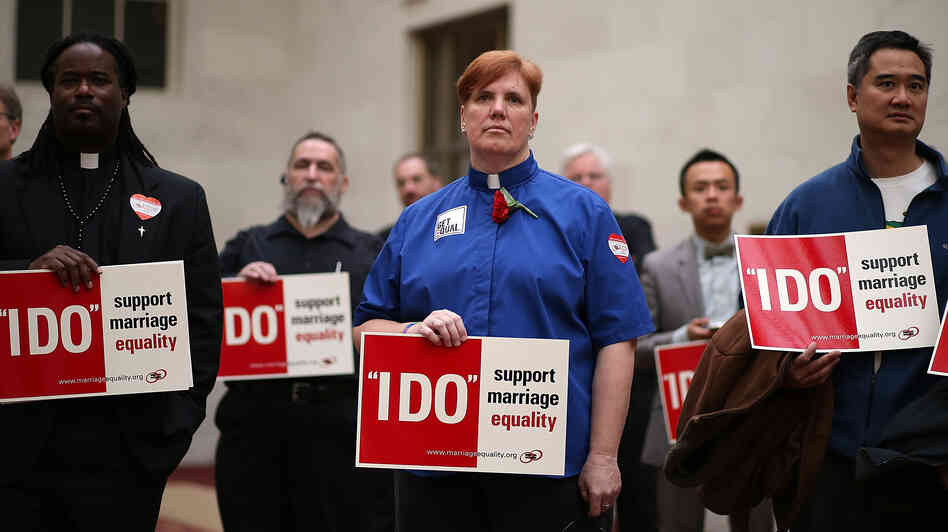 Same-sex marriage advocates protest outside the county clerk's office in San Francisco on Feb. 14. Same-sex marriage advocates protest outside the county clerk's office in San Francisco on Feb. 14.
