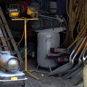 This photo from OSHA's investigation file shows harnesses and ropes hanging unused in a shed close to Bin No. 9. OSHA cited Haasbach LLC for failing to provide its workers with required safety devices, and for failing to train them in safety procedures.