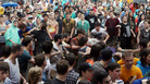 Fans in the mosh pit during the performance of Liturgy at the 2012 Pitchfork Music Festival in Union Park, Chicago, on July 14, 2012. Fans in the mosh pit during the performance of Liturgy at the 2012 Pitchfork Music Festival in Union Park, Chicago, on July 14, 2012.