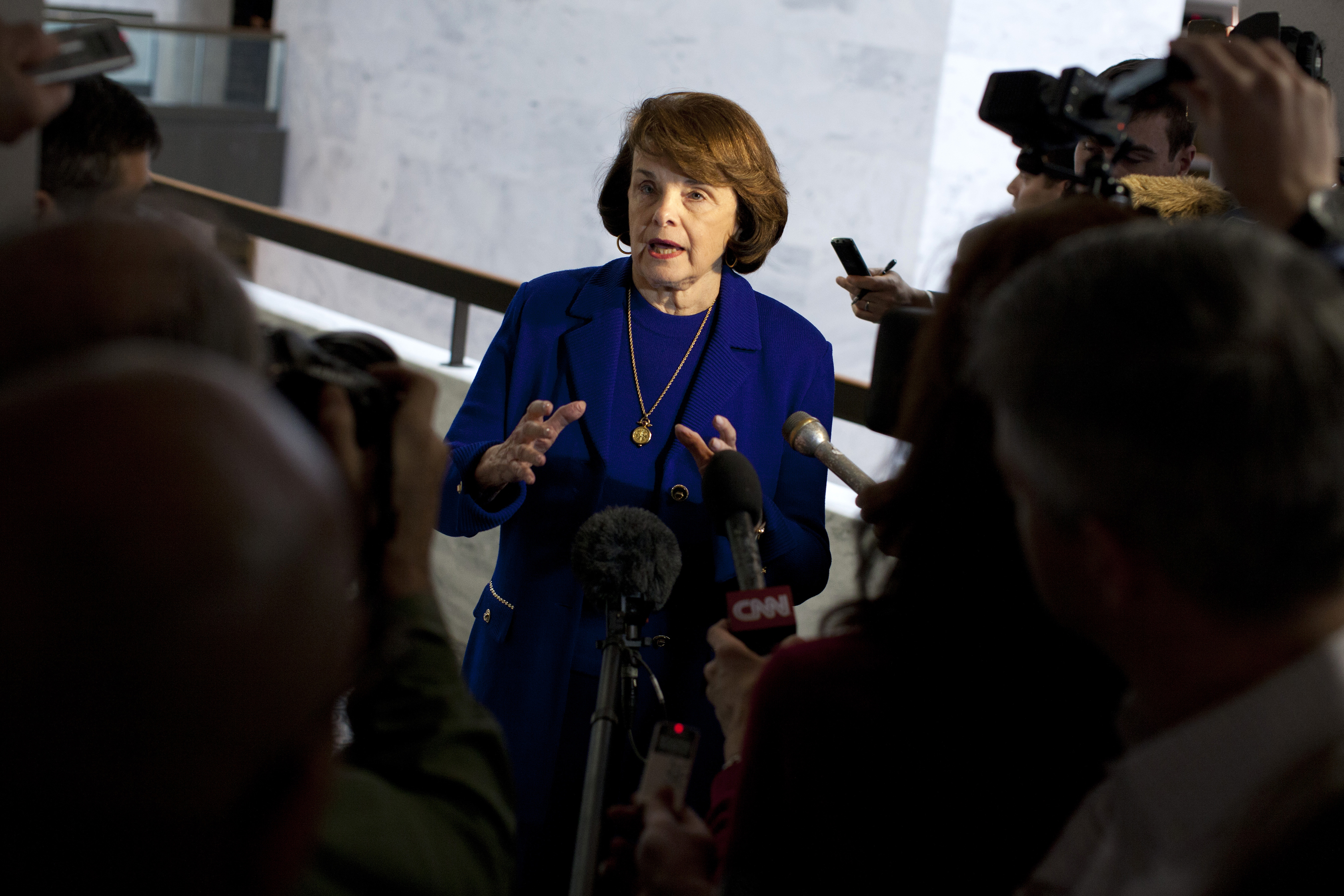 Senate Intelligence Committee Chairman Dianne Feinstein, D-Calif., speaks with reporters on March 5, after a closed-door committee vote on the nomination of John Brennan as CIA director. 