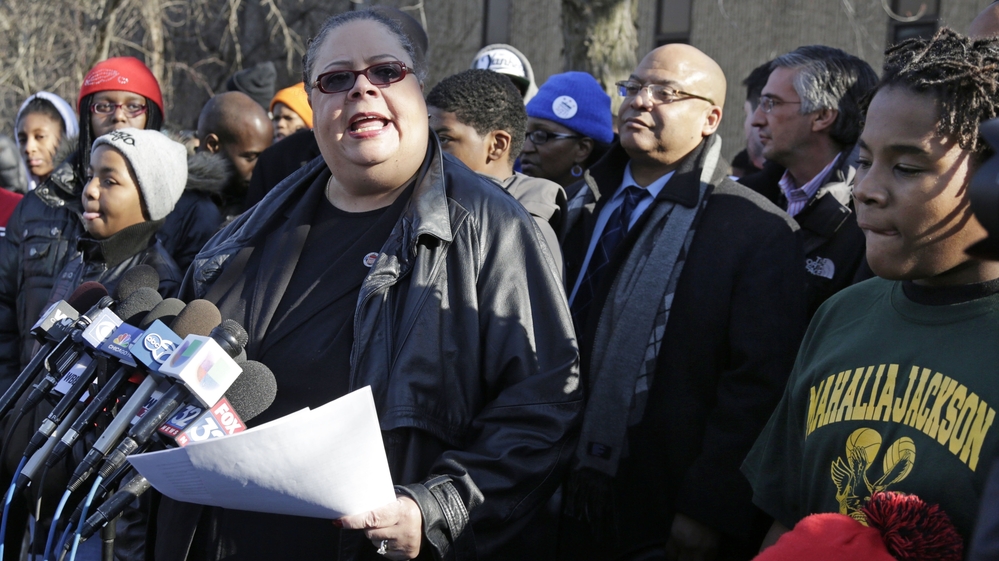 Chicago Teachers Union President Karen Lewis speaks outside Mahalia Jackson Elementary School in Chicago about the planned closing of 54 public schools. Opponents say the plan will disproportionately affect minority students in the nation's third-largest school district.