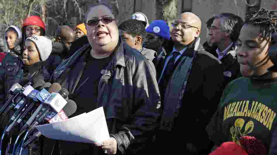Chicago Teachers Union President Karen Lewis speaks outside Mahalia Jackson Elementary School in Chicago about the planned closing of 54 public schools. Opponents say the plan will disproportionately affect minority students in the nation's third-largest school district.