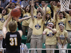 Pittsburgh fans try to distract Wichita State's Ron Baker as he shoots a free throw during a second-round game in the NCAA college basketball tournament in Salt Lake City on Thursday. The distractions of the tournament are so great that worker productivity suffers. Pittsburgh fans try to distract Wichita State's Ron Baker as he shoots a free throw during a second-round game in the NCAA college basketball tournament in Salt Lake City on Thursday. The distractions of the tournament are so great that worker productivity suffers.