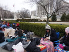 More than two dozen people bundled up to camp out before the U.S. Supreme Court for a seat to watch oral arguments in a same-sex marriage case on Tuesday. More than two dozen people bundled up to camp out before the U.S. Supreme Court for a seat to watch oral arguments in a same-sex marriage case on Tuesday.