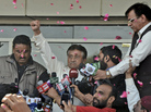 Former Pakistani President Pervez Musharraf greets supporters upon his arrival at Karachi airport in Pakistan on Sunday. Former Pakistani President Pervez Musharraf greets supporters upon his arrival at Karachi airport in Pakistan on Sunday.