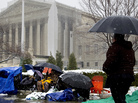 People wait through winter weather Monday outside the U.S. Supreme Court, in line hoping to attend oral arguments in the same-sex marriage cases being argued Tuesday and Wednesday. People wait through winter weather Monday outside the U.S. Supreme Court, in line hoping to attend oral arguments in the same-sex marriage cases being argued Tuesday and Wednesday.