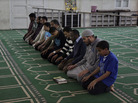 Egyptian men and boys pray at a mosque in Assiut, southern Egypt, that serves as the headquarters for Gamaa al-Islamiya, a group that once waged a bloody insurgency, attacking police and Christians in a campaign to create an Islamic state. Now the Islamist group says it's determined to ensure law and order in the area. Egyptian men and boys pray at a mosque in Assiut, southern Egypt, that serves as the headquarters for Gamaa al-Islamiya, a group that once waged a bloody insurgency, attacking police and Christians in a campaign to create an Islamic state. Now the Islamist group says it's determined to ensure law and order in the area.