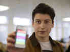 Nick d'Aloisio displays his mobile application Summly, which Yahoo recently purchased for a reported $30 million. But the Internet company is killing the app and integrating the algorithm that drives it into its own technology.