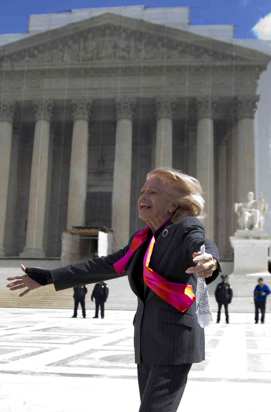 Plaintiff Edith Windsor, who challenged the federal Defense of Marriage Act, looks toward supporters in front of the Supreme Court on Wednesday. Plaintiff Edith Windsor, who challenged the federal Defense of Marriage Act, looks toward supporters in front of the Supreme Court on Wednesday.