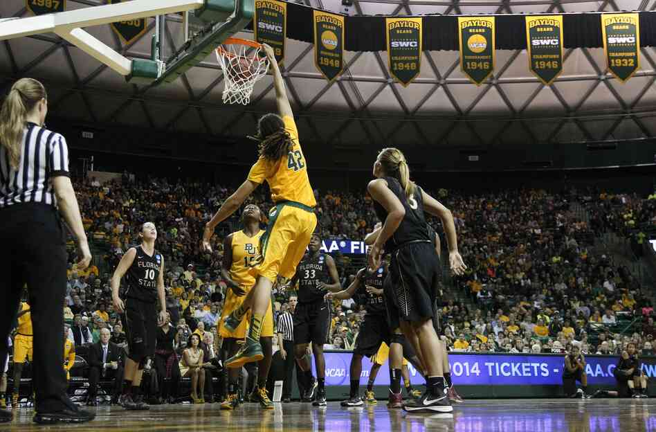 Baylor's Brittney Griner (42) dunks as Florida State's Leonore Rodriguez (10) and Alexa Deluzio (3) look on; Baylor defeated Florida State 85-47 on Tuesday in Waco, Texas. Baylor's Brittney Griner (42) dunks as Florida State's Leonore Rodriguez (10) and Alexa Deluzio (3) look on; Baylor defeated Florida State 85-47 on Tuesday in Waco, Texas.