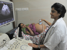 Dr. Nayna Patel performs an ultrasound exam on Rinku Macwan, at a hospital near Ahmedabad, India. It's illegal in India for doctors to reveal a baby's sex during these exams, but many do it anyway. Dr. Nayna Patel performs an ultrasound exam on Rinku Macwan, at a hospital near Ahmedabad, India. It's illegal in India for doctors to reveal a baby's sex during these exams, but many do it anyway.