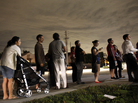 Voters line up into the night outside a Miami polling station, some waiting for hours to vote in the 2012 presidential election. Voters line up into the night outside a Miami polling station, some waiting for hours to vote in the 2012 presidential election.