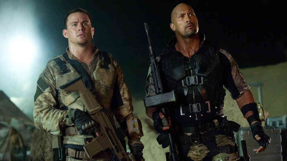 Duke (Channing Tatum) and Roadblock (Dwayne Johnson) are live-action G.I. Joes in the big-screen franchise's latest thoroughly disposable installment. Duke (Channing Tatum) and Roadblock (Dwayne Johnson) are live-action G.I. Joes in the big-screen franchise's latest thoroughly disposable installment.