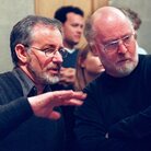 Steven Spielberg and John Williams confer during a break in rehearsal at Symphony Hall on Feb. 21, 1998 in Boston. Tom Hanks stands in back. Steven Spielberg and John Williams confer during a break in rehearsal at Symphony Hall on Feb. 21, 1998 in Boston. Tom Hanks stands in back.