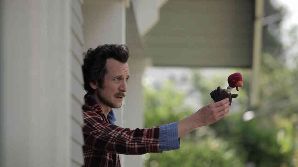 The bewildered Dolph (Jack Plotnick) is just as baffled about the bizarro plot of Wrong as most of the audience will be. He's searching for his missing dog — or something like that. The bewildered Dolph (Jack Plotnick) is just as baffled about the bizarro plot of Wrong as most of the audience will be. He's searching for his missing dog — or something like that.