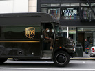 A UPS truck drives along Grant Street on in San Francisco, California. A UPS truck drives along Grant Street on in San Francisco, California.