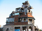 Over the past three decades, Arthur and Cynthia Wood turned their four-story home into a work of art. They purchased the brick tenement at the intersection of Downing and Quincy streets in 1979 for $2,100 in cash. Over the past three decades, Arthur and Cynthia Wood turned their four-story home into a work of art. They purchased the brick tenement at the intersection of Downing and Quincy streets in 1979 for $2,100 in cash.