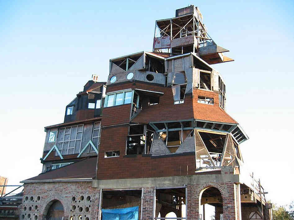 Over the past three decades, Arthur and Cynthia Wood turned their four-story home into a work of art. They purchased the brick tenement at the intersection of Downing and Quincy streets in 1979 for $2,100 in cash. Over the past three decades, Arthur and Cynthia Wood turned their four-story home into a work of art. They purchased the brick tenement at the intersection of Downing and Quincy streets in 1979 for $2,100 in cash.