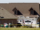 The home of Kaufman County District Attorney Mike McLelland is surrounded by police tape in Forney, Texas, on Monday. Authorities launched a massive investigation into the weekend killings of McLelland and his wife. The home of Kaufman County District Attorney Mike McLelland is surrounded by police tape in Forney, Texas, on Monday. Authorities launched a massive investigation into the weekend killings of McLelland and his wife.