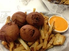 Chili Bombs with a side of Totally Unnecessary Cheese Sauce. Chili Bombs with a side of Totally Unnecessary Cheese Sauce.